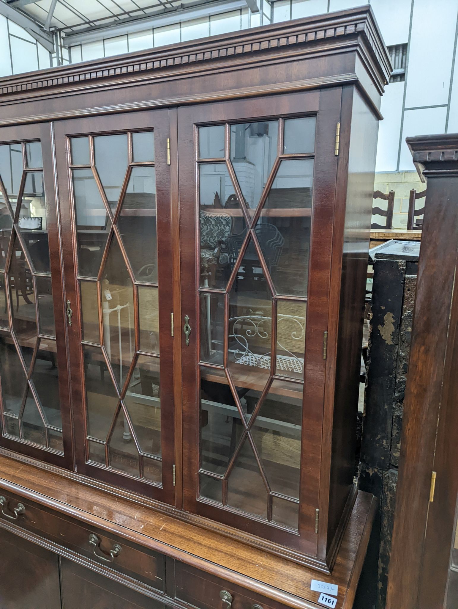 A reproduction George III style mahogany library bookcase, length 154cm, depth 41cm, height 193cm